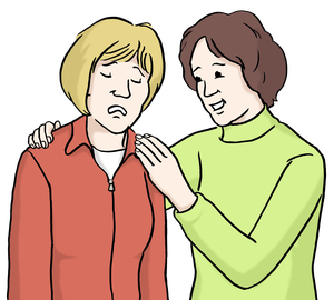 Eine Person tröstet eine andere Person.